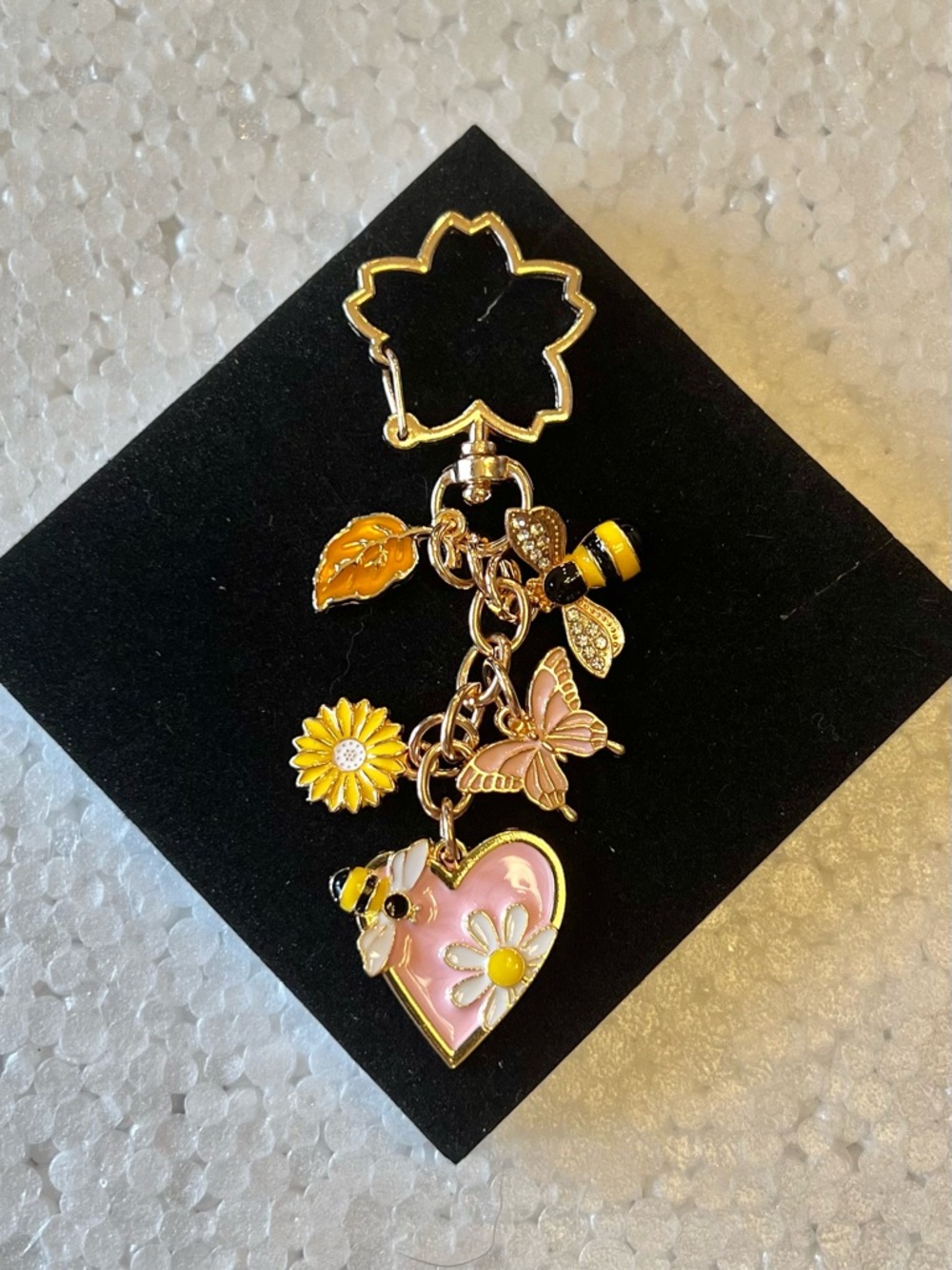 Pink floral bee bag charm